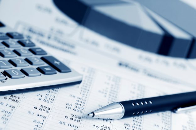 paperwork with pens and calculator